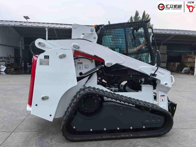 Lánctalpas csúszókormányzású rakodógép